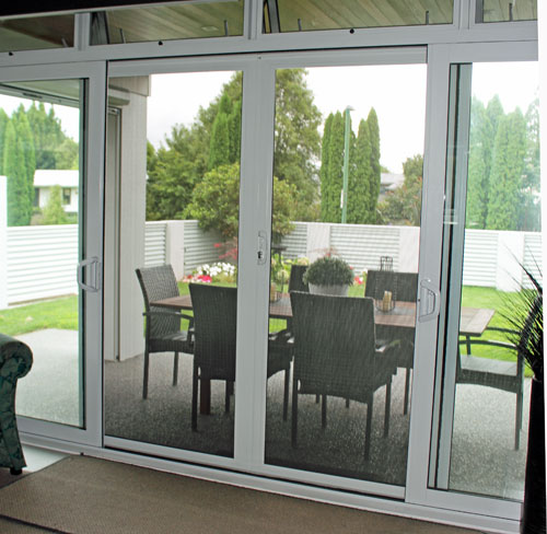 Security from Clearguard sliding doors for locking up this home and leaving the doors open