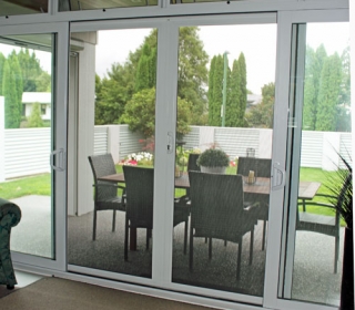 Security from Clearguard sliding doors for locking up this home and leaving the doors open